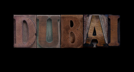 the word Dubai in old letterpress wood type