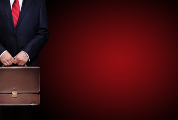 business person holding a briefcase