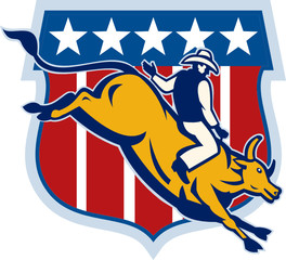 Rodeo cowboy bull riding with american shield