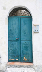 Wooden green door.