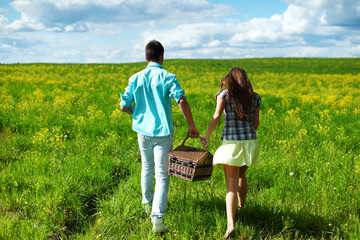 lovers hug on picnic