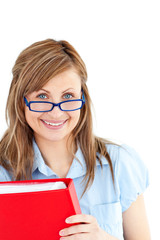 Delighted caucasian businesswoman holding holding a red folder