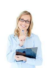 Pensive businesswoman holding a clipboard