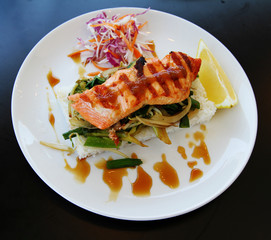 baked salmon with green salad and rice