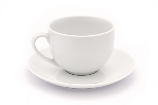 empty white tea cup and saucer