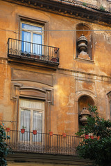 Fototapeta na wymiar small balcony on the facade of building