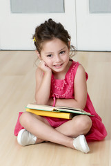 preschooler with book