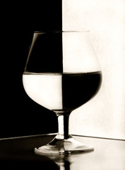 Wine glass on black and white backlight