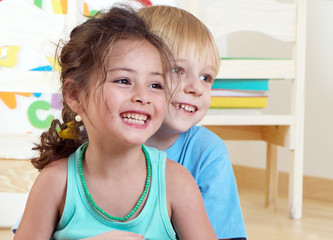 Portrait happy kids in kindergarten