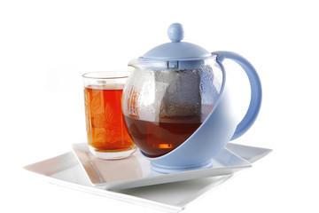 tea in glass and kettle