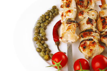 roast pork shish kebab on white