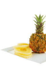Fototapeta na wymiar raw pineapple and slices