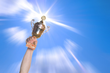 sports cup on a background of the bright sky.