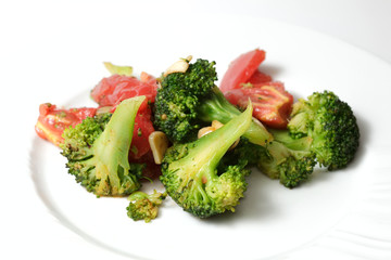salad of broccoli on a white plate