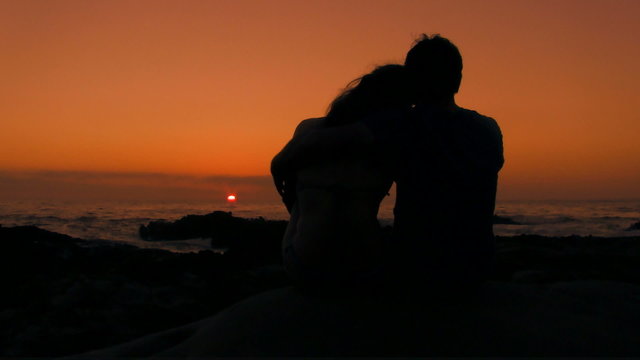 Romantic embrace at sunset - HD