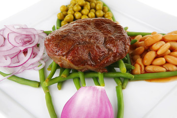 fresh grilled meat medalion on beans