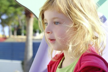 beautiful blond little girl children portrait in park