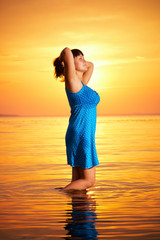 Fototapeta premium woman standing in water