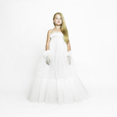 Fototapeta na wymiar Girl-doll in white vintage dress