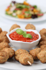 Kebab with tomato sauce