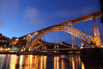 Dom Luis I Bridge illuminated at night. Oporto, Portugal