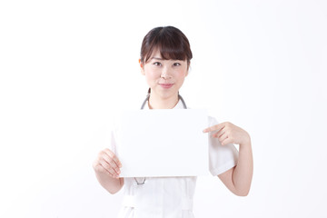 Fototapeta premium 看護士・女性・ボード