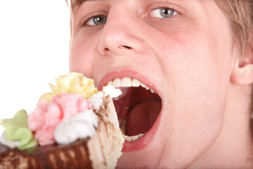 Man eating chocolate cake.