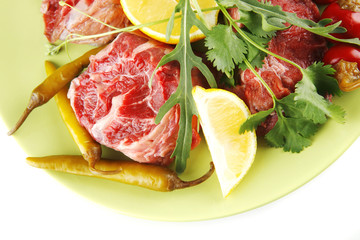 raw beef medallion on green