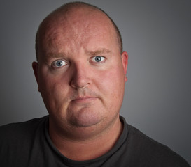 dark portrait photo of depressed down male