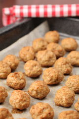 Roast meatballs on baking sheet
