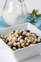 Vanilla cereals with blueberries. Shallow DOF