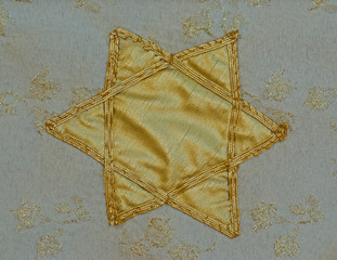 Tapestry with closeup of gold Star of David