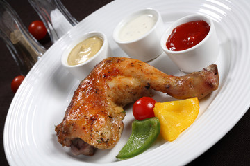 Roasted chicken leg and vegetables