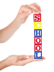 wooden blocks in the  teenager hand