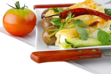 cheese cannelloni on white plate