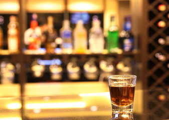 A shot of whiskey at bar