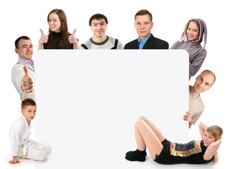 Group of young people holding a blank board