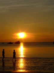 Gold sunset over beach, Thailand.