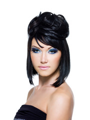 Fototapeta premium Face of a beautiful woman with blue make-up