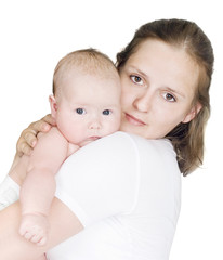 Young woman holding a child