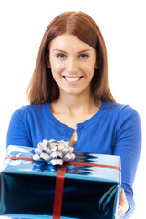 Young smiling woman with gift, isolated on white