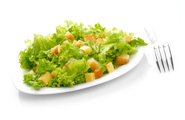 Close-up of salad on white plate