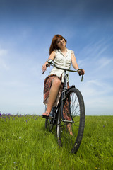 Fototapeta premium Girl with a bicycle