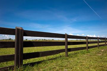 Fototapeta na wymiar Wooden Fence Under Blue Sky,Adobe RGB Colorspace