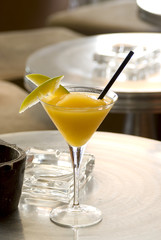 Mango Daiquiri with two slices of mango in martini-glass