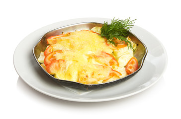 Baked vegetables - zucchini and tomatoes with cheese