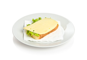 Open sandwich with cheese and lettuce