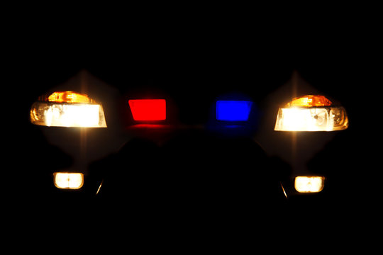 Bright Headlights Of Police Car