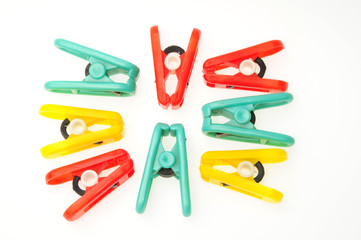 Colorful Cloth  Pegs On White background