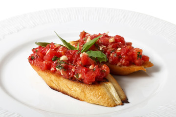 bread with sauce on a plate. object on a white background